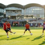Spænska landsliðið í rauðum treyjum fagnar sigri á Evrópumeistaramótinu 2024